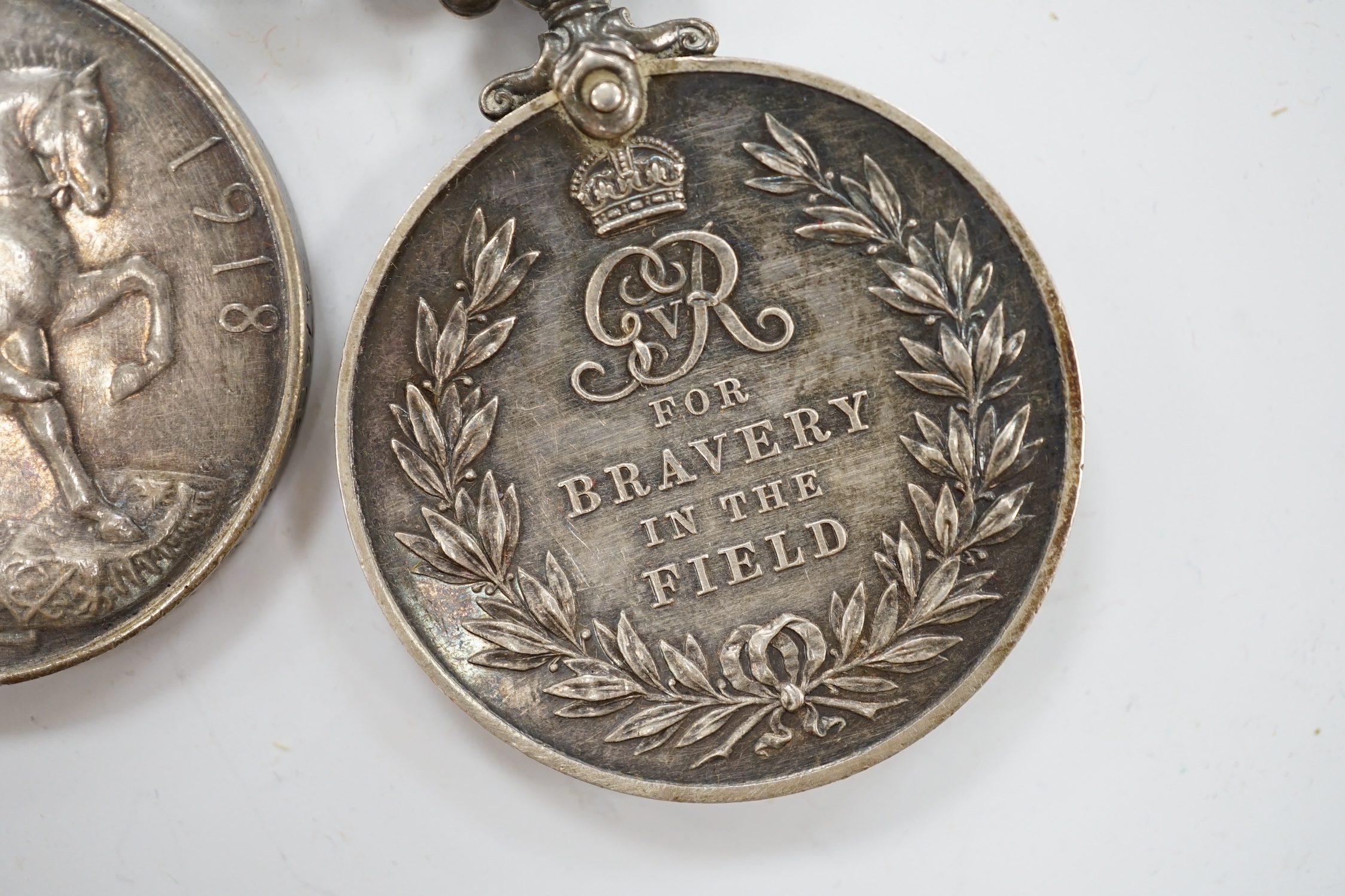 Two First World War medal groups; a military medal group awarded to Pte. H.S. Cribb, 23rd Northumberland Fusiliers, comprising; the Military Medal for Bravery in the Field, the Special Constabulary Medal, the War Medal a